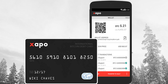 Tarjeta de XAPO y app en el teléfono.