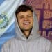Jack Mallers entre bitcoin y bandera de El Salvador.