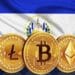 Bandera de El Salvador con monedas de LTC, BTC y ETH al frente.