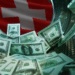 Dinero lavado y bandera de Suiza.