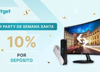 Foto de un manitor curvo de 24 pulgadas y un monedero Ledger Nano X