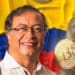 Bitcoin sobre bandera de Colombia y Petro