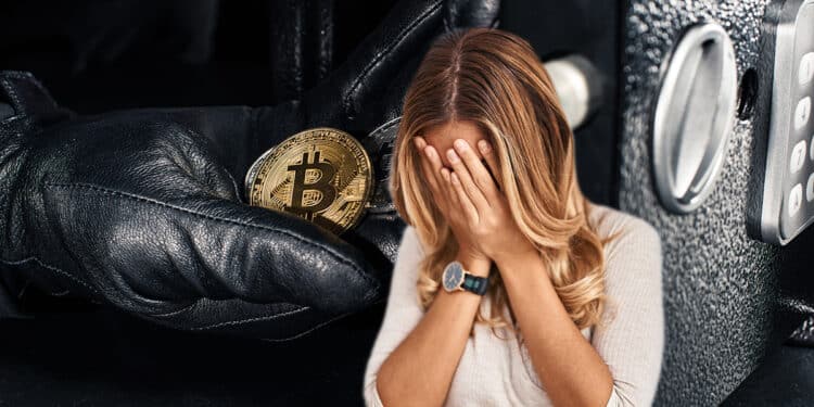 Mujer estafada al lado de un bitcoin.