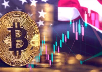 Bitcoin junto a bandera de Estados Unidos y gráficos.