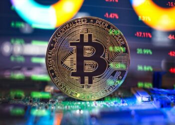 moneda de bitcoin con indicadores de mercado superpuestos