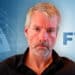 Michael Saylor y símbolo de seguridad con logo de FTX