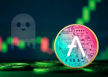 moneda de Aave sobre mesa con grafico de precio creciente en el fondo y logo de GHO