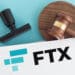 Papeles reguladores junto a logo de FTX.
