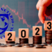 2023 junto a monedas y logo de FMI.