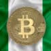 Bandera de Nigeria y BTC