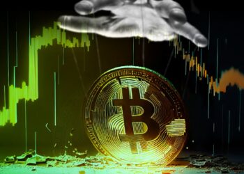 mano con hilo atados a los dedos con moneda de bitcoin y grafico de precio en el fondo