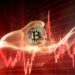 Bitcoin y gráfico rojo.