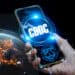 Celular con CBDC y logo de FMI junto al planeta tierra.