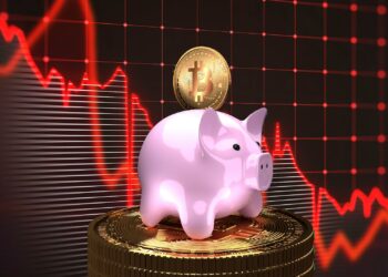 Chanchito ahorrando bitcoin y gráfico decreciente.