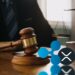 Tribunal, logo de Ripple y token XRP.