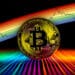 Bitcoin y gráfico arcoíris.