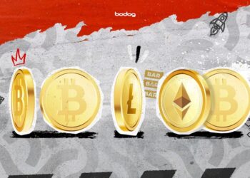 Monedas doradas de Bitcoin, Litecoin y ether en fila, usadas en el casino Bodog.