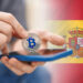 Bitcoin y bandera de España.