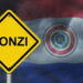 señal de advertencia de ponzi junto a bandera de paraguay