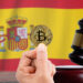 Bitcoin y bandera de España.