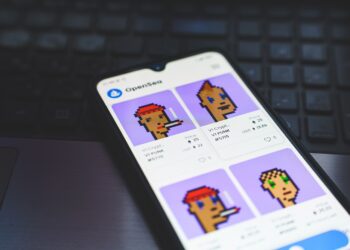 CryptoPunks is a non-fungible token collection on the Ethereum blockchain. NFT on smarthphone screen.