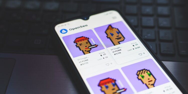 CryptoPunks is a non-fungible token collection on the Ethereum blockchain. NFT on smarthphone screen.