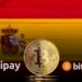 Bitcoin, bandera de España y logos de Wipay y Bitnovo.