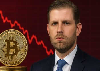 Retrato de Eric Trump frente a un fondo rojo que muestra un gráfico bursátil en caída. Fuente: imagen generada por CriptoNoticias mediante la inteligencia artificial de ChatGPT.