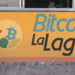 La fachada de una vivienda en la que se lee Bitcoin La Laguna con el logo de la iniciativa comunitaria.